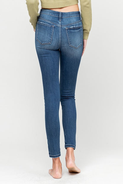 Mid Rise Distressed Skinny - Medium wash